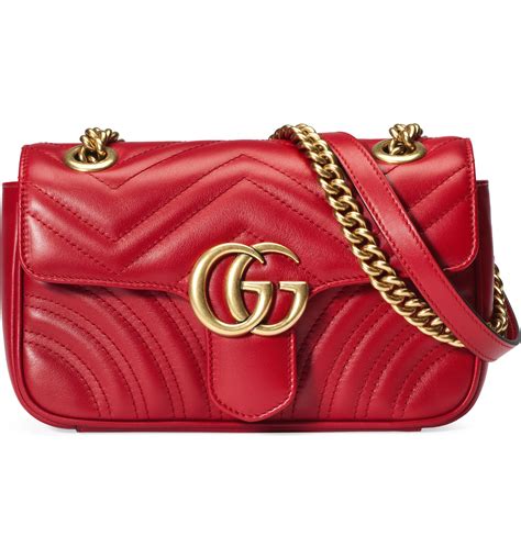 gg matelassé leather mini bag.